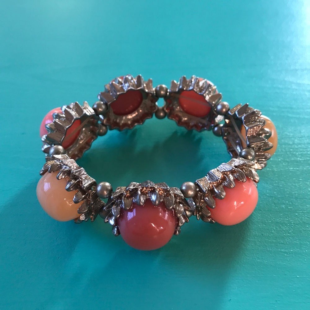 Vintage gold bracelet with peach toned stones